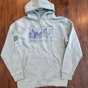 MTN OPS Women's Premium Apparel Line Art Mountain Scene Hoodie in Sage Green